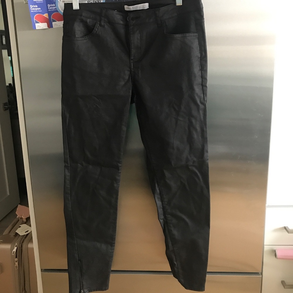 Black faux leather skinny jeans